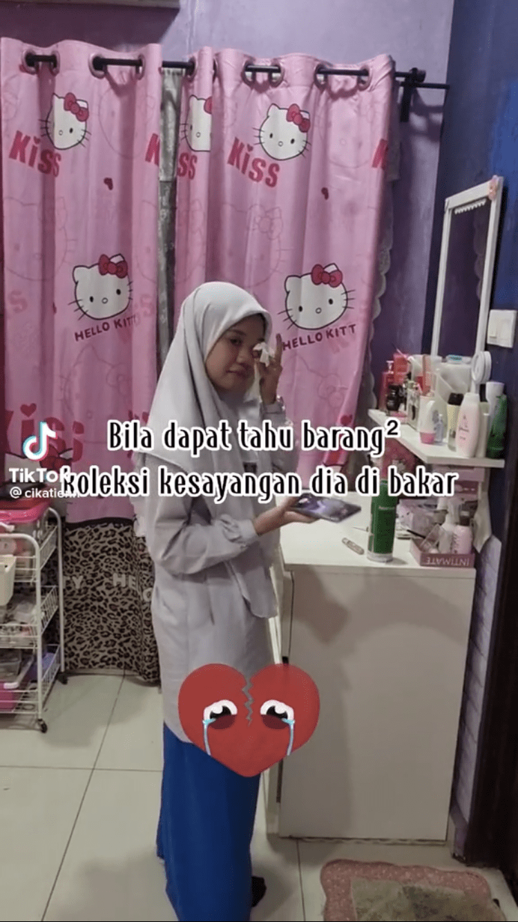 Girl cries over burnt K-Pop collectibles