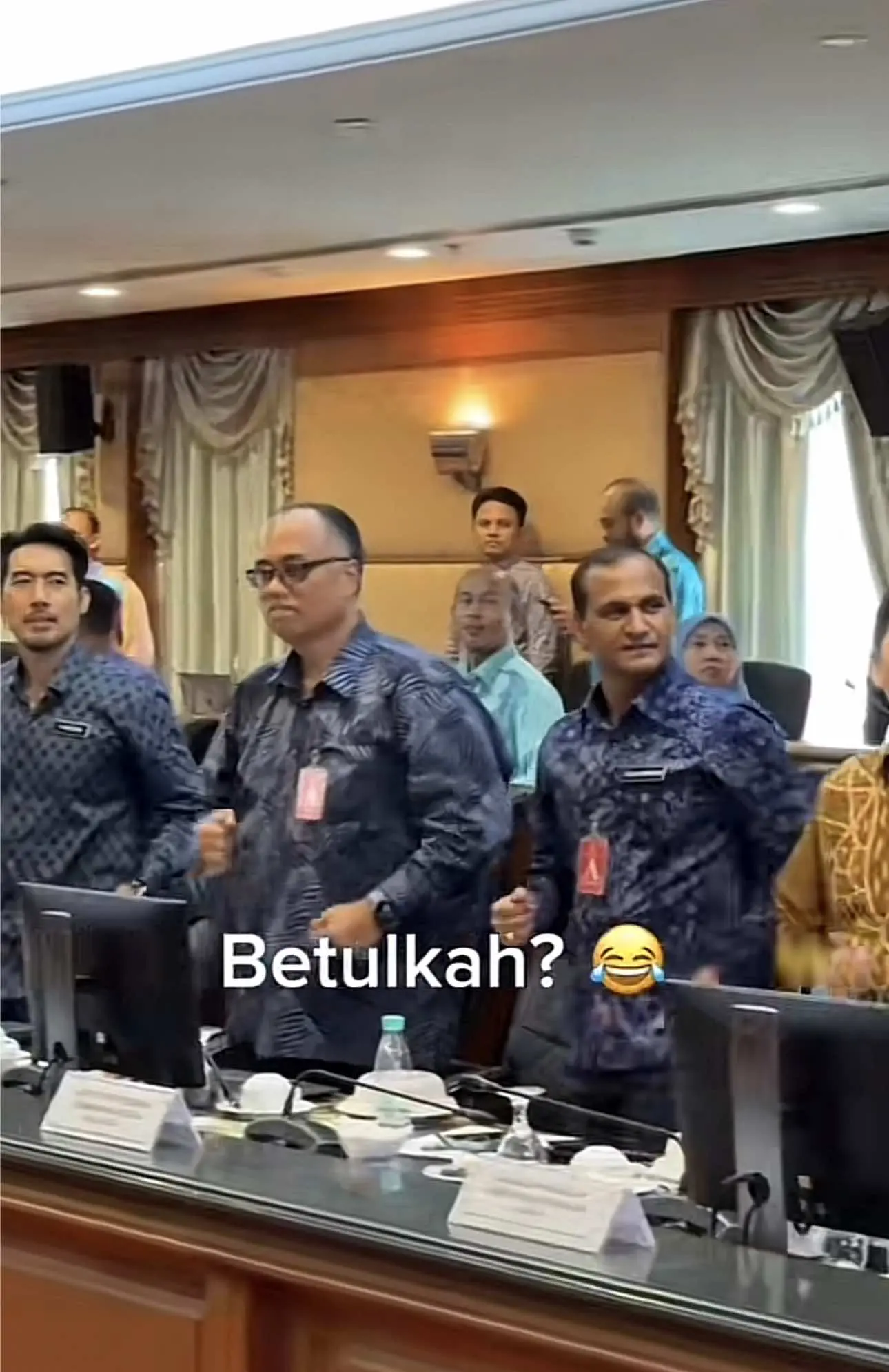 Three ministers at the front dancing