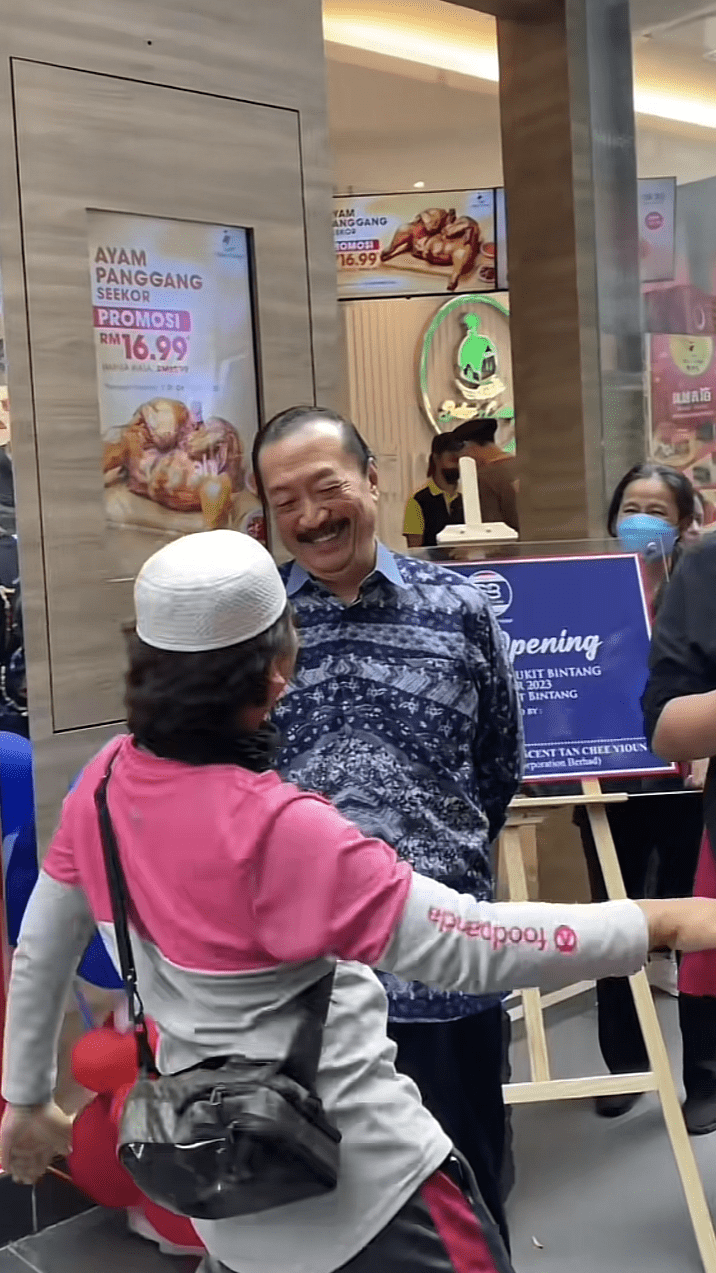 tan sri vincent tan with rider