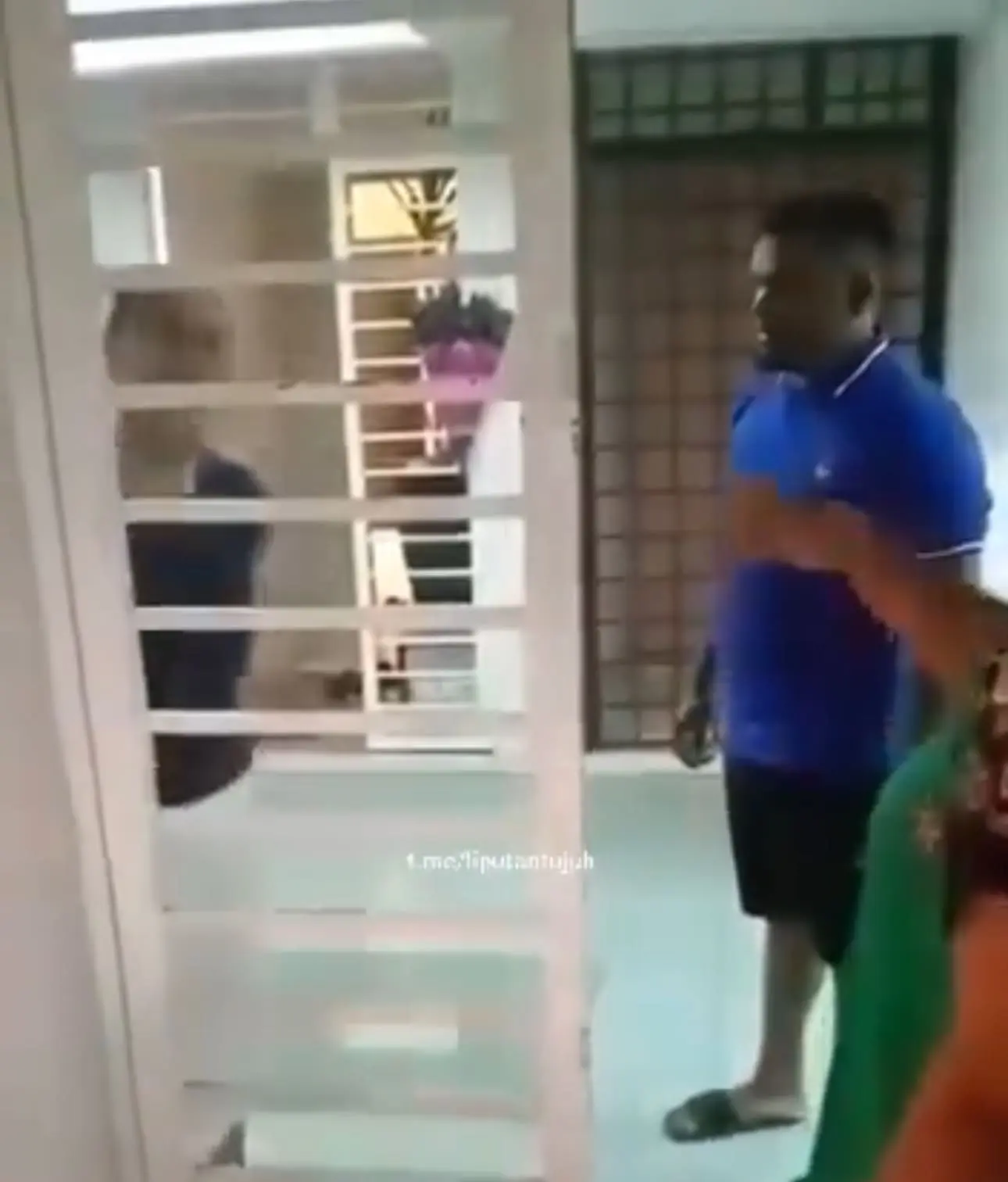 Indian woman's family standing up against the man