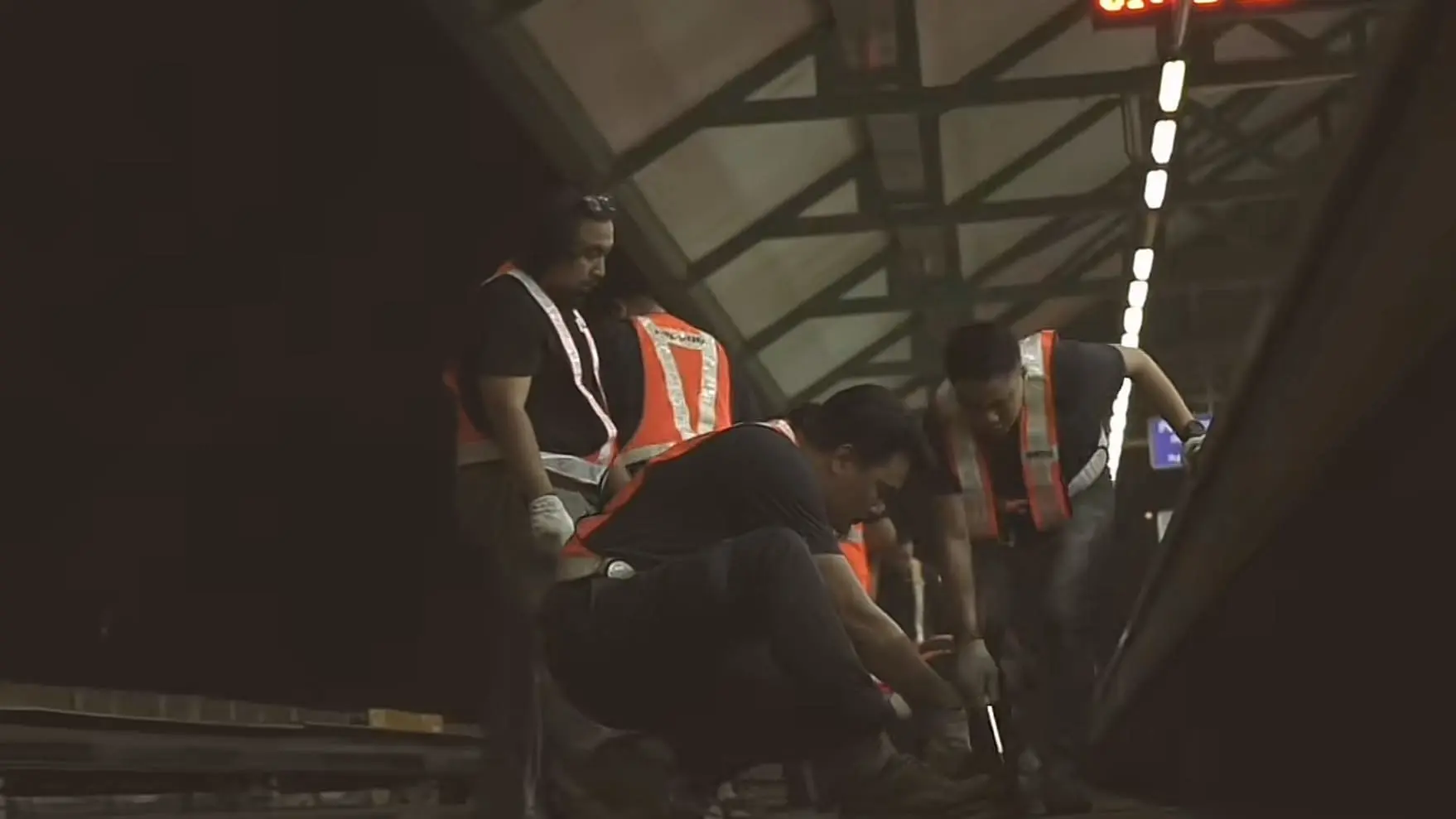 Contractors helping each other to fix the trails at the LRT 