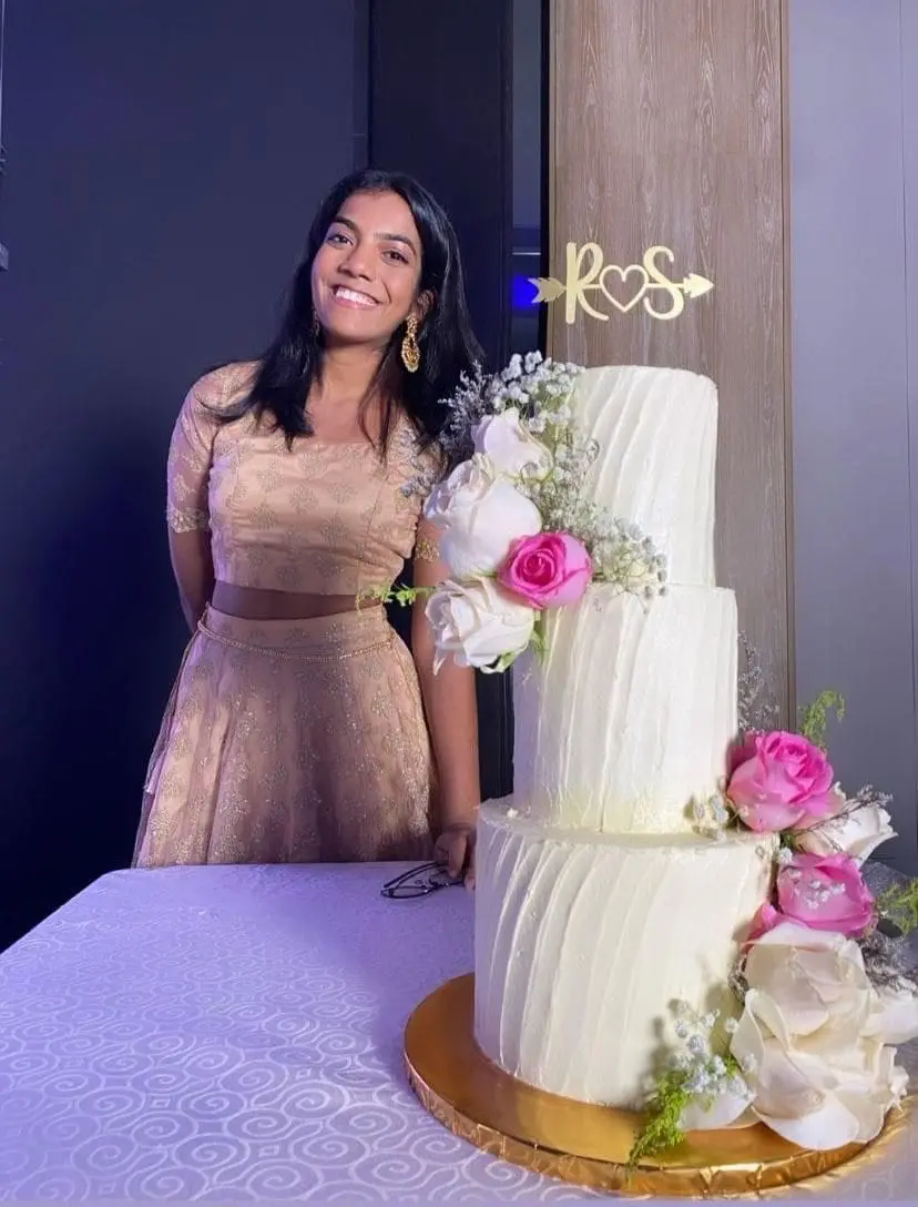 Sonea Edwards with her own baked cake 