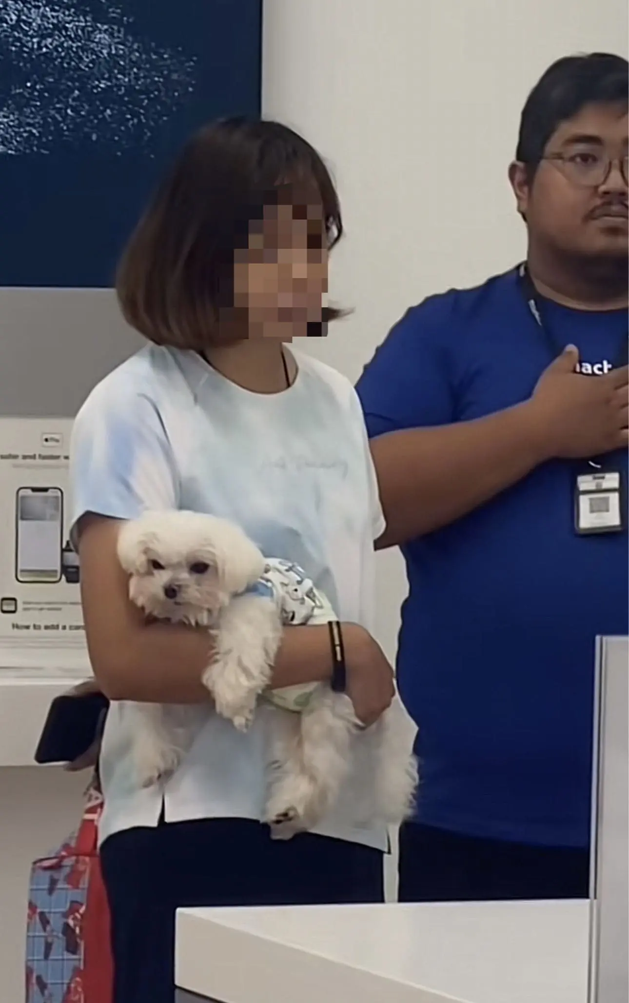 Woman with her dog in Machines store