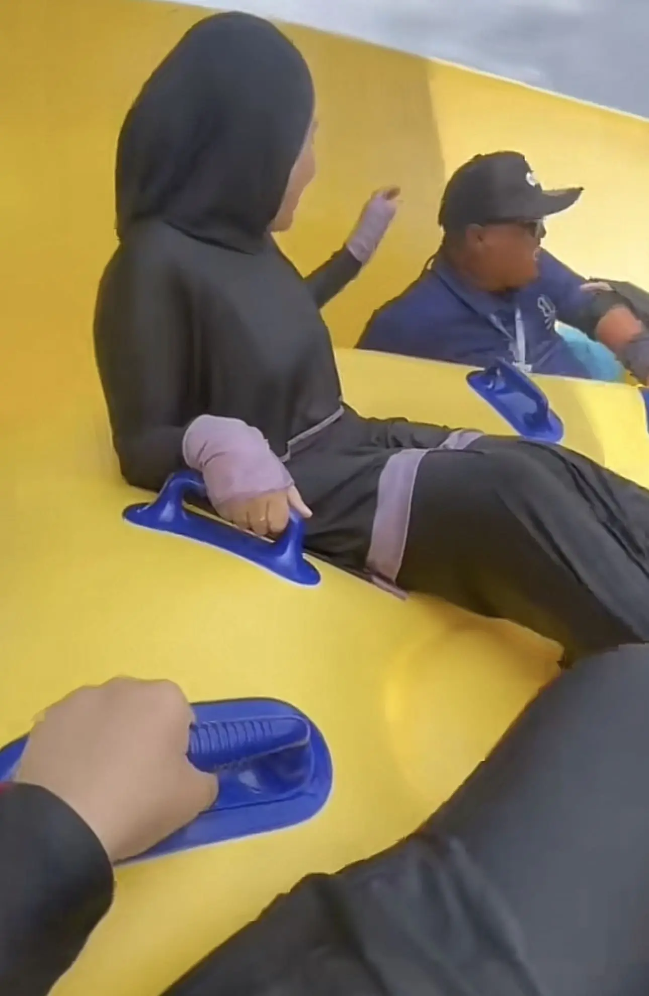 Msian lifeguard slips and falls while sliding