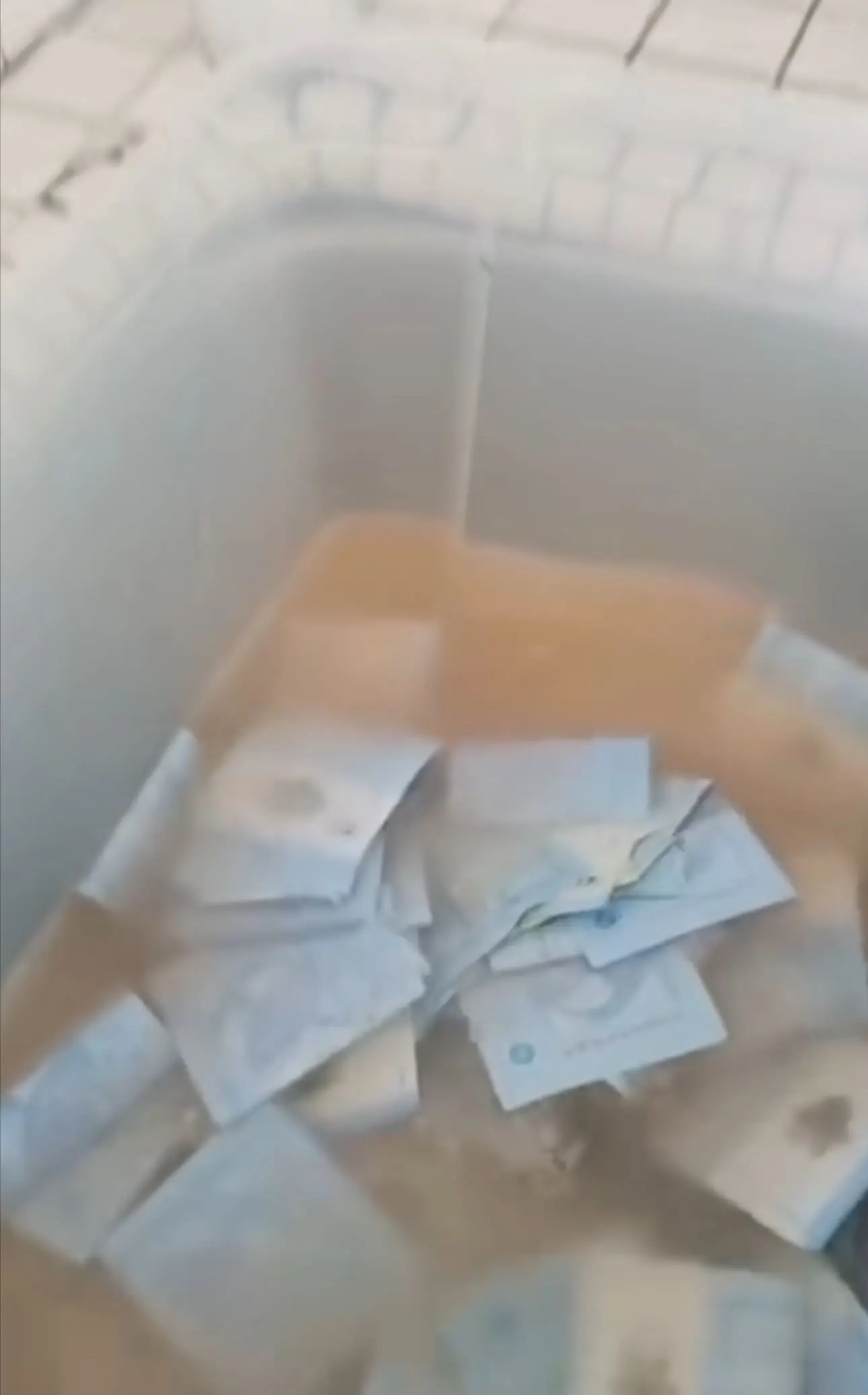 RM1 scattered around the brown water