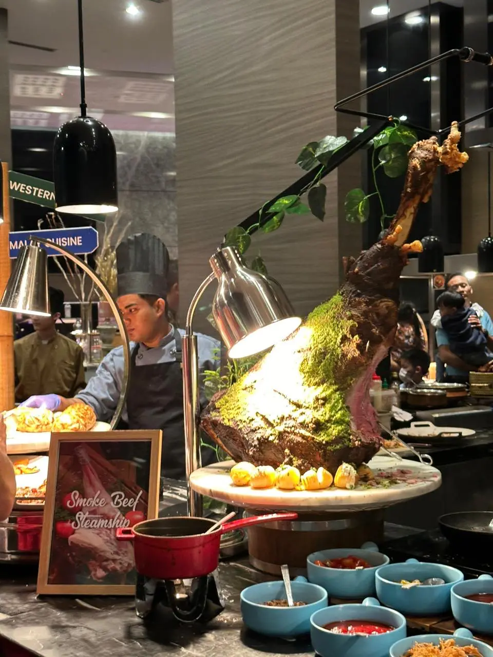 Cooked steak on display at the buffet
