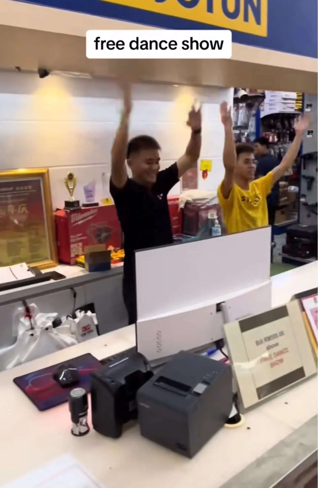 Employees dancing in sync