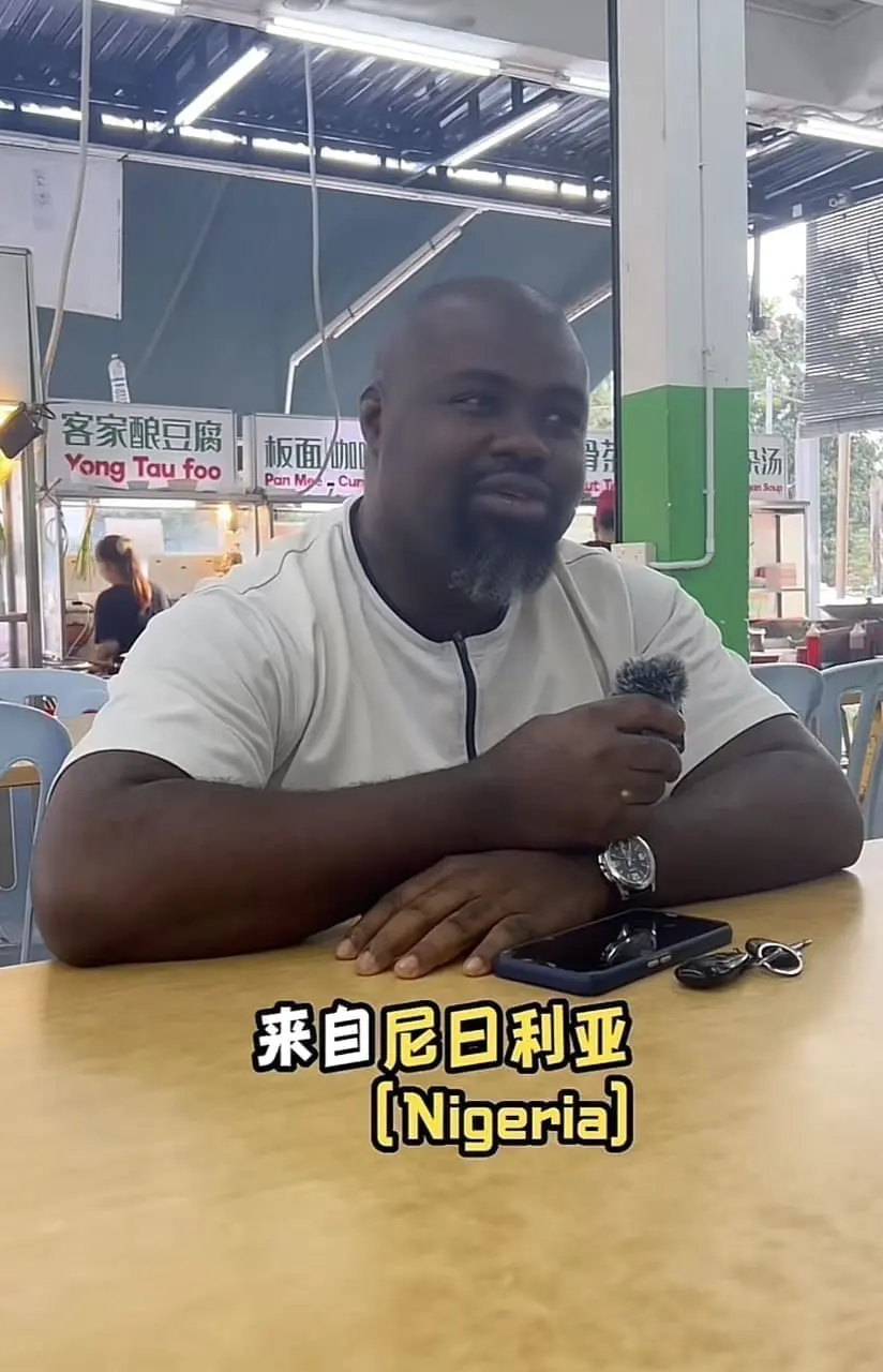 Nigerian man who is a vendor at a food court