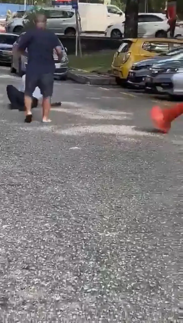 One of 2 mans fell down at parking lot