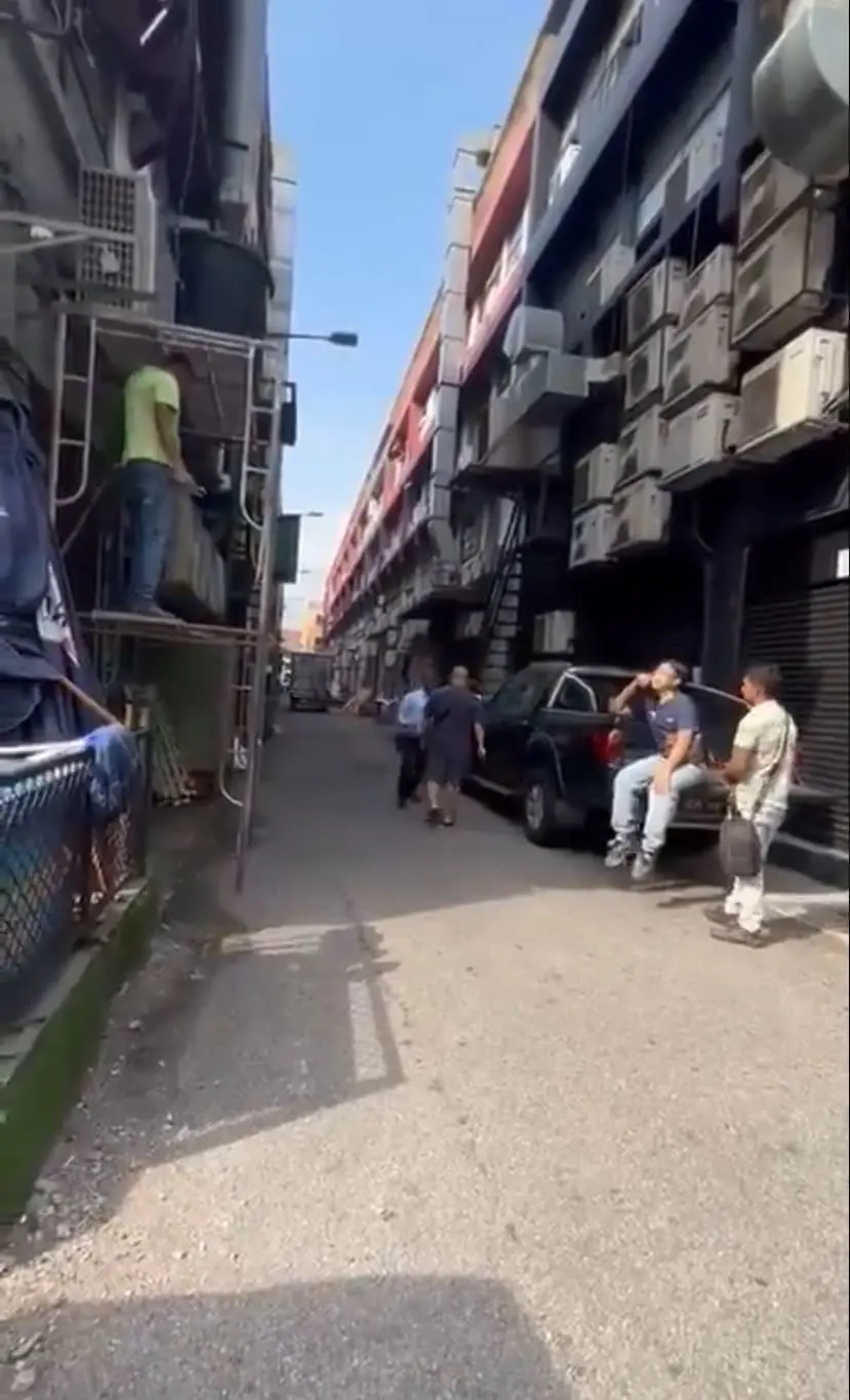 Bystanders just minding their own business despite the fight happening in front of them