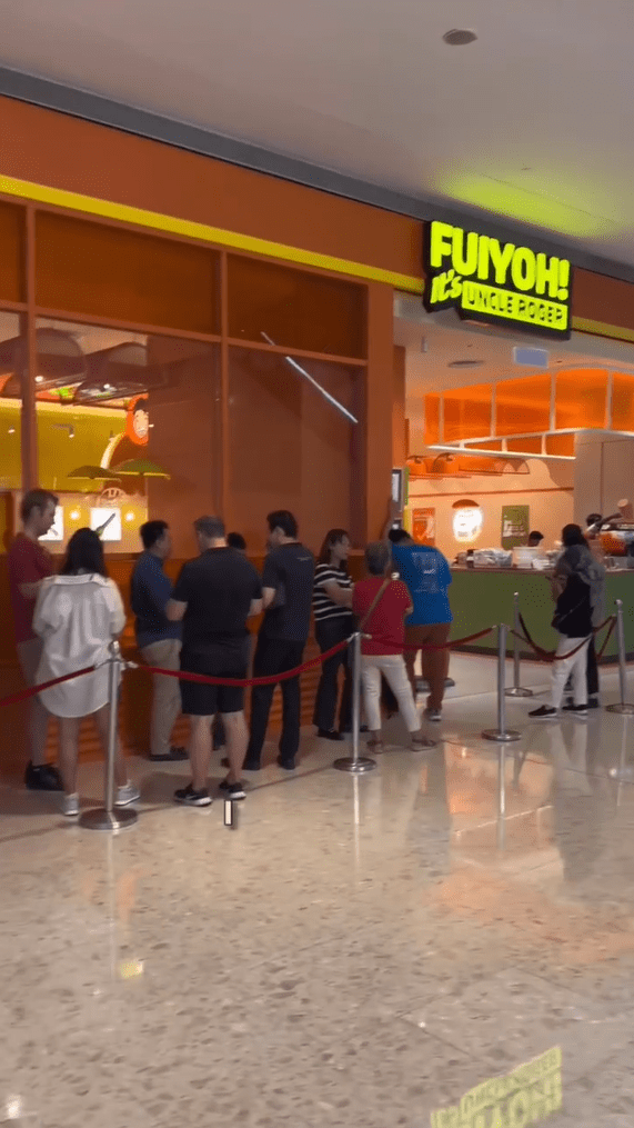 Line outside Uncle Roger's Restaurant