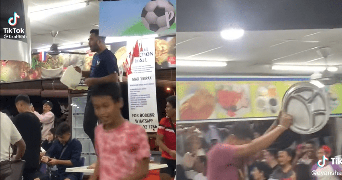 football fans being rowdy at Sabah restaurant