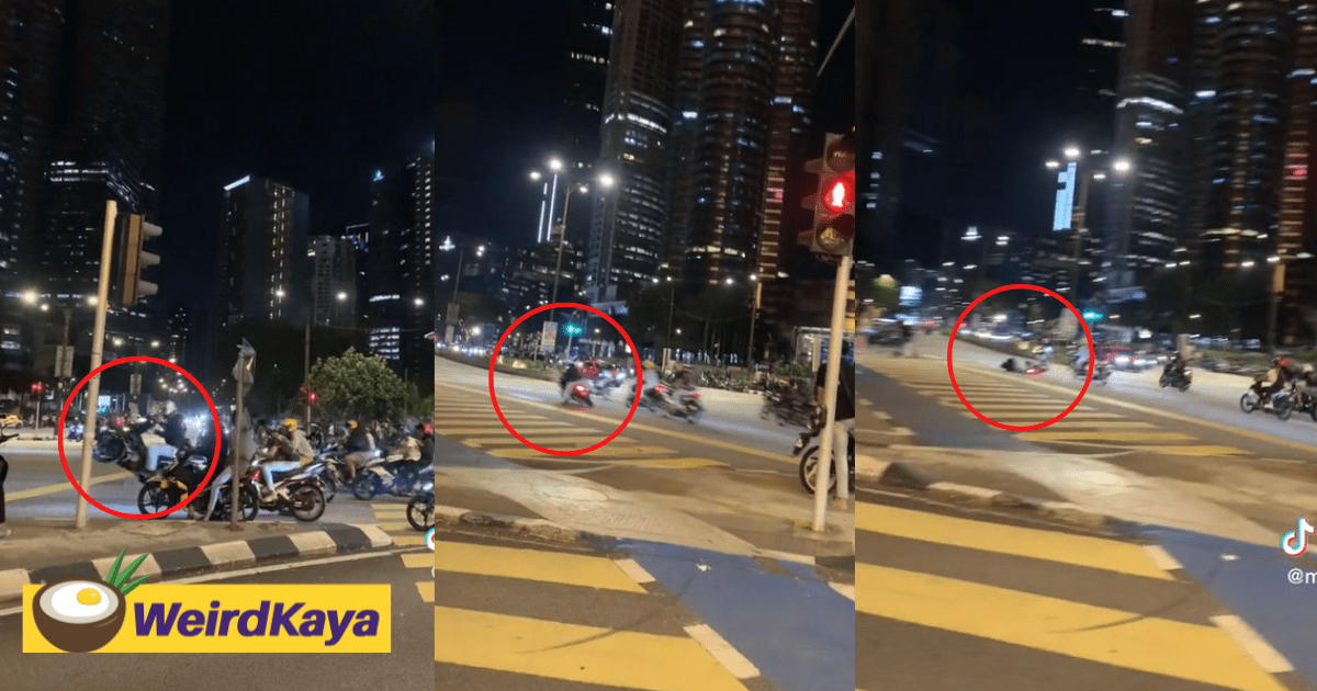'Mat Rempit' Tries To Show Off Moves With A Wheelie At KLCC, Falls Down & Humiliates Himself