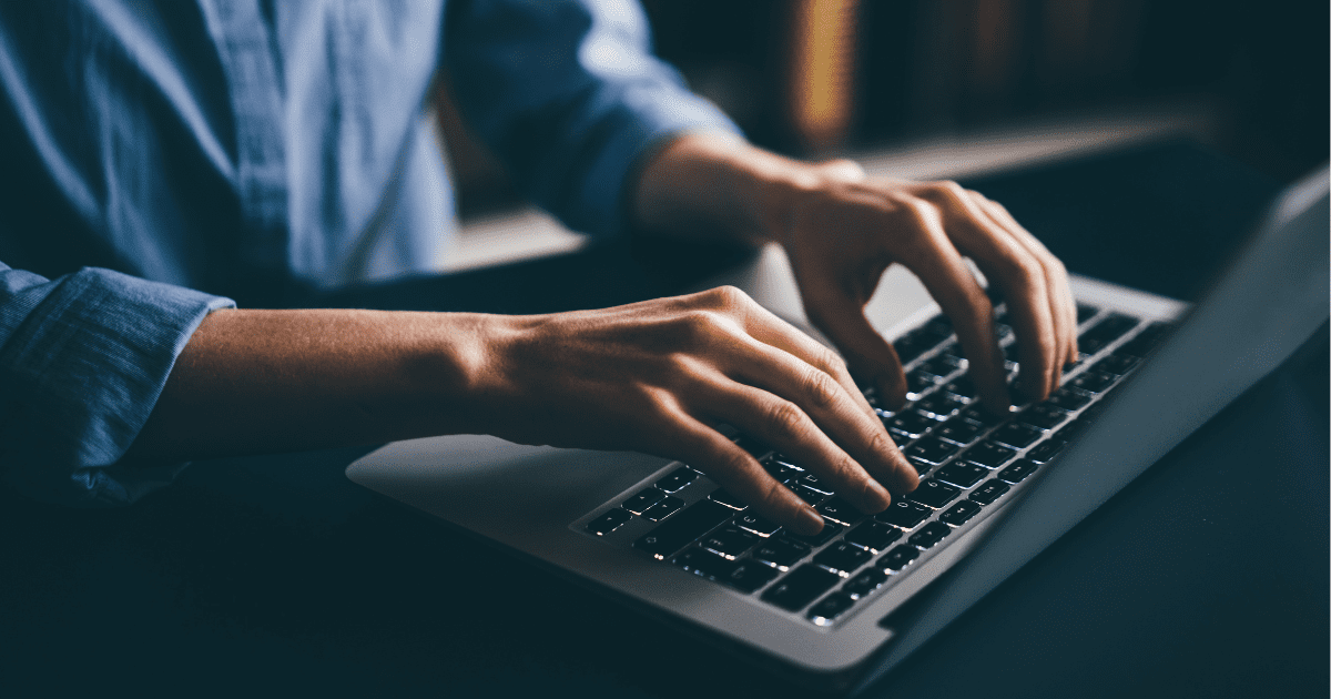 typing on a laptop