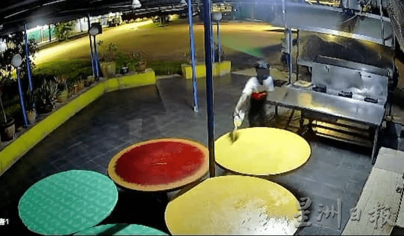 Loan shark pouring gasoline at Xu's store