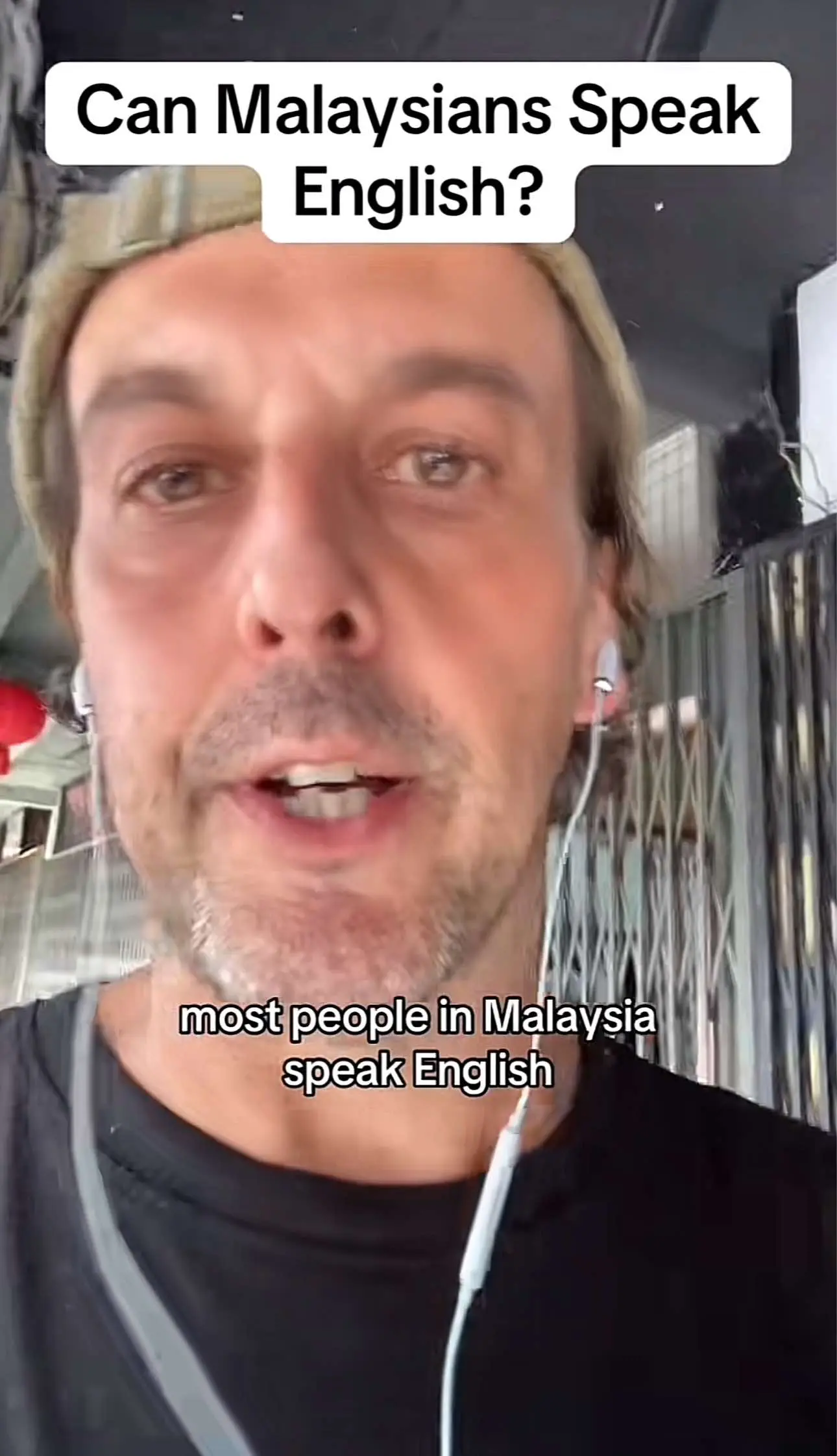 Greg explaining that Malaysians can speak English 
