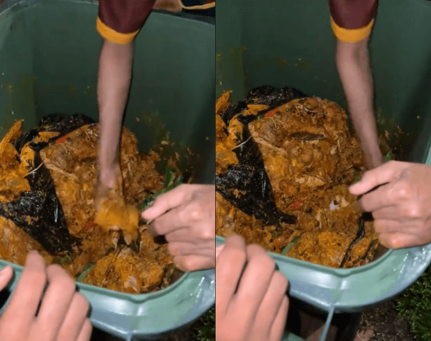 Mamak staff digging through bin to find retainers