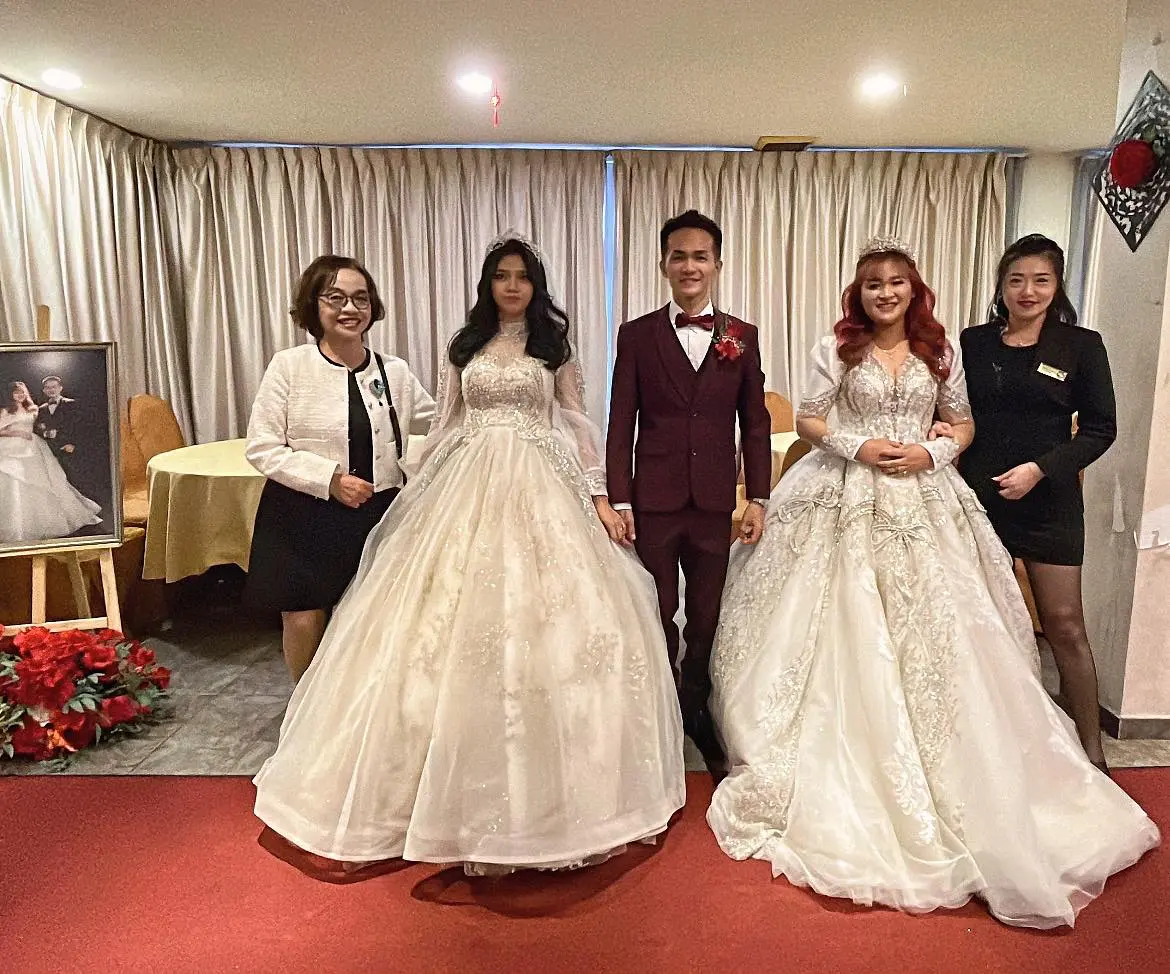 Sarawak man with his 2 wives