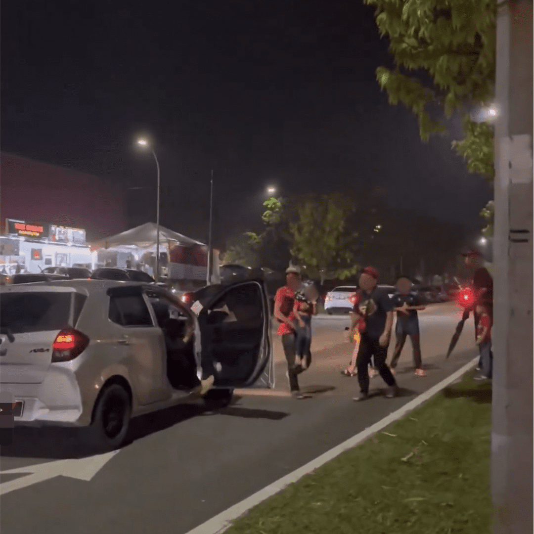 Man carrying his daughter who was knocked by the driver