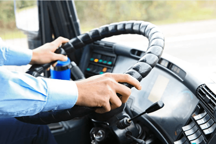 Man driving a bus