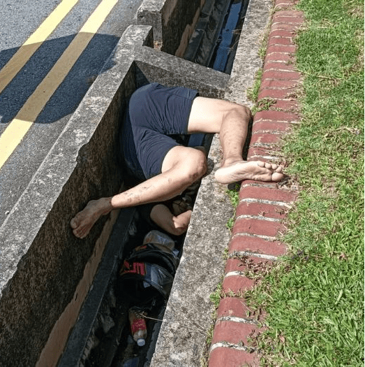 Man falls into drain in Singapore