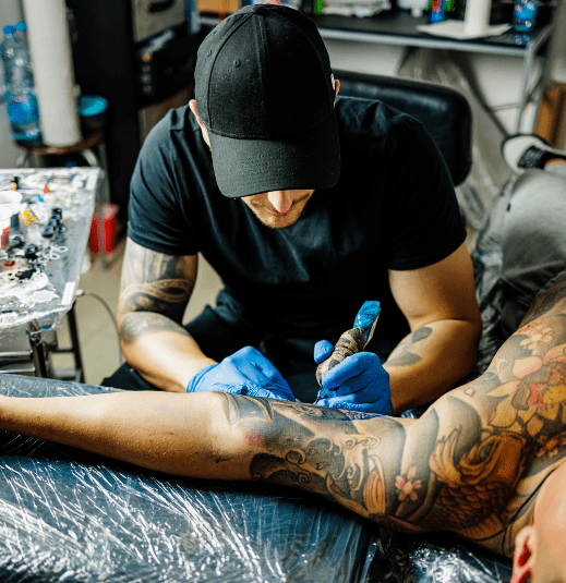 man getting tattooed