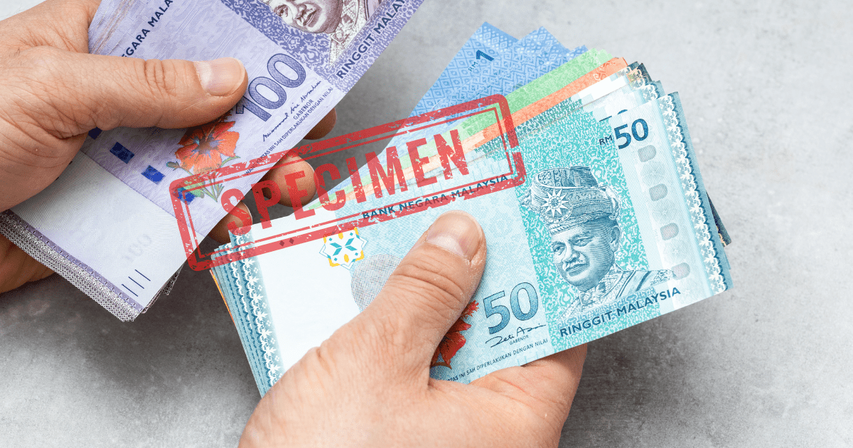 man is counting money