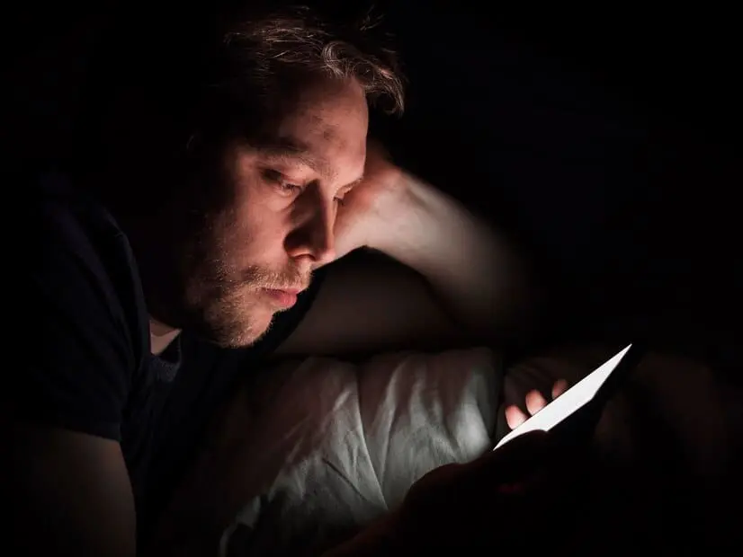 Man looking at his phone screen