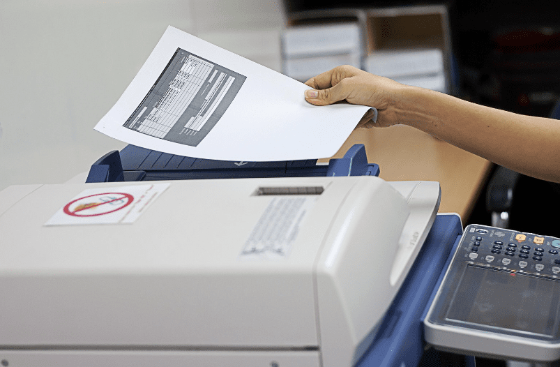 man photocopying