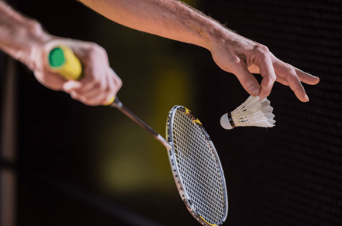 man playing badminton