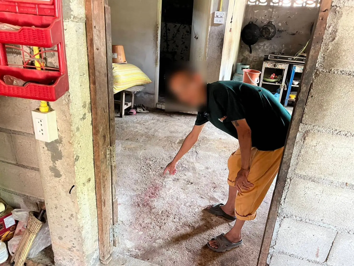 Man points where Phongsakorn was found dead