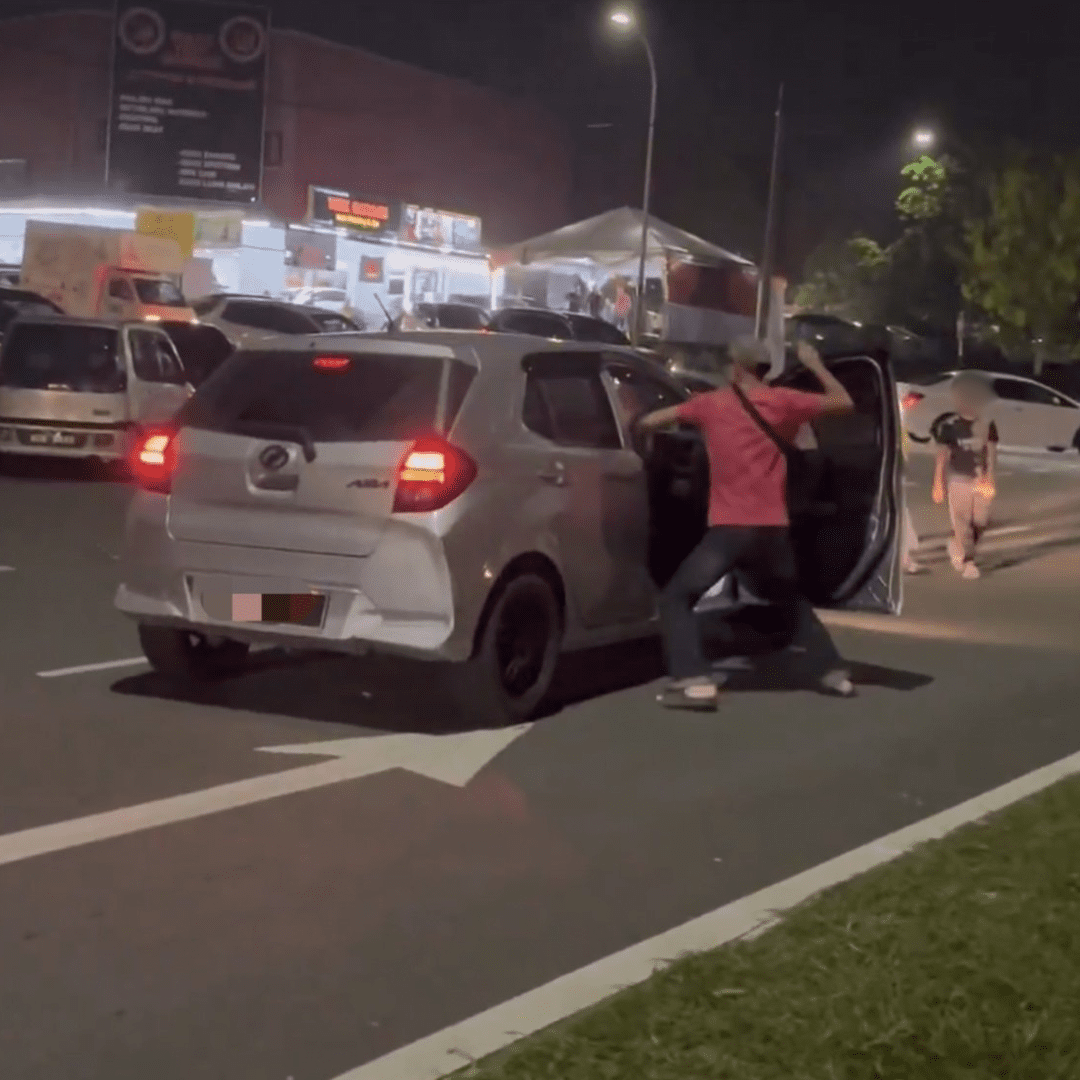 Man punching a female driver