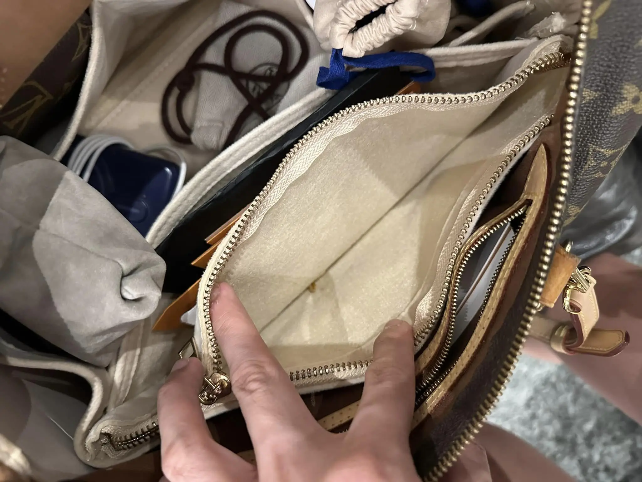 man showing empty pocket inside a bag