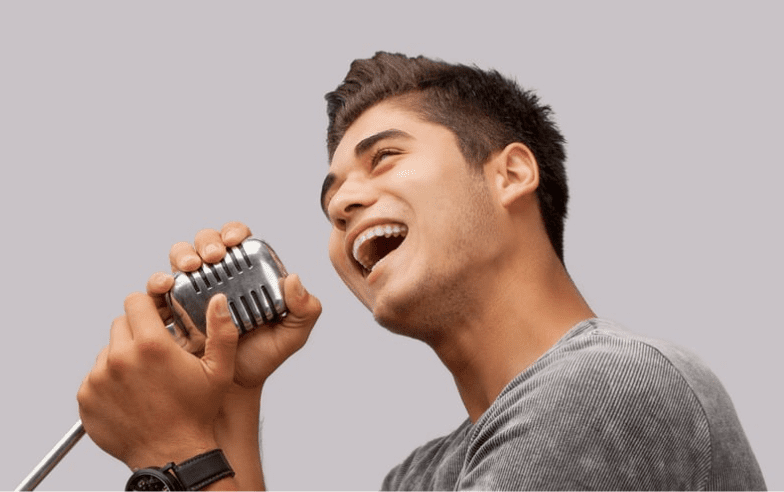 Man singing into mic
