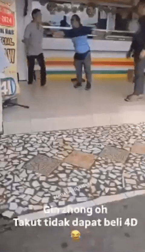 Man stops 2 men from fighting at lottery shop