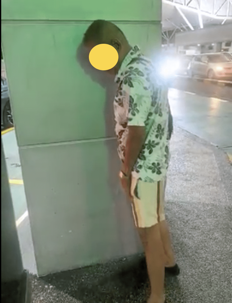 Man urinates at JB customs 2