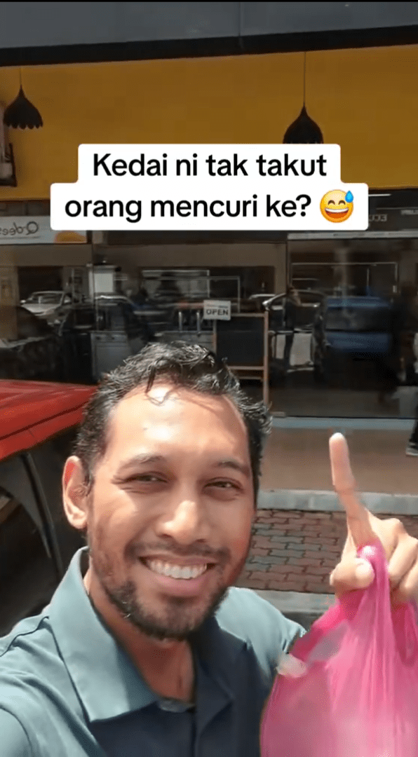 M'sian man visting mixed rice stall