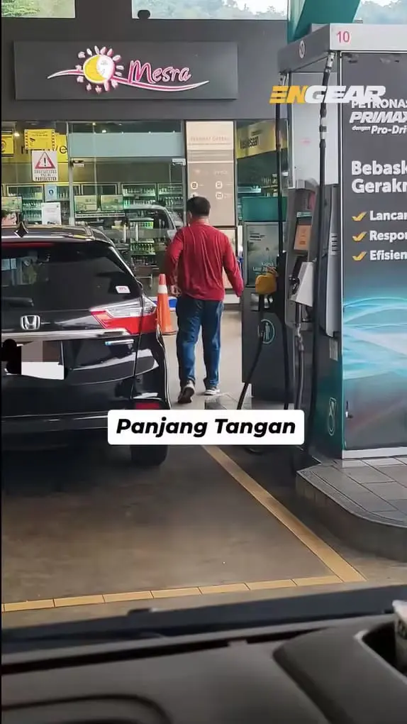 Man walks off after pumping RON95 illegally