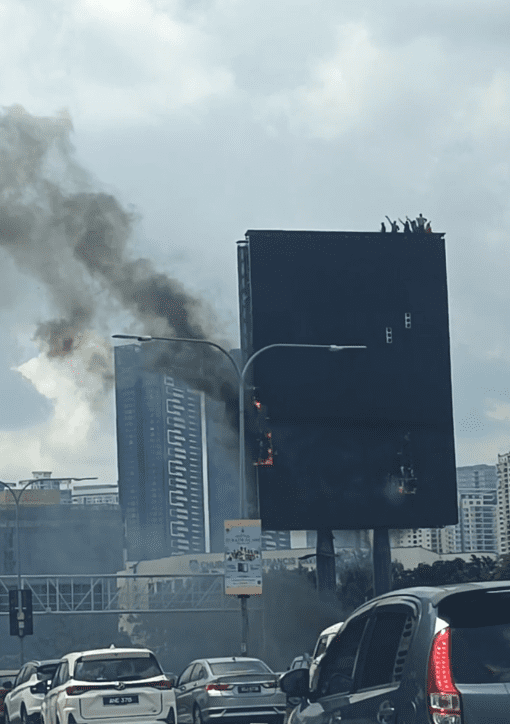Man waving on the billboard