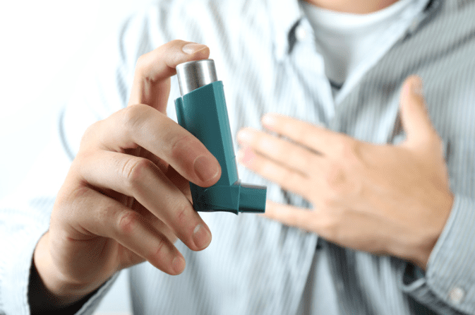 man with an inhaler