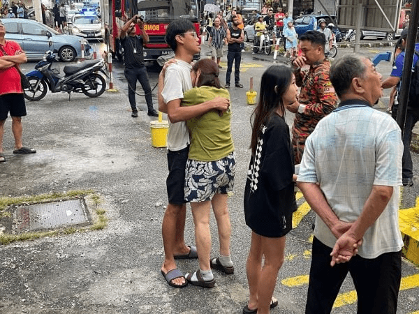 Man's family member crying