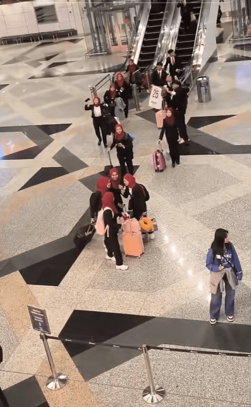 MARA students wave at crowd
