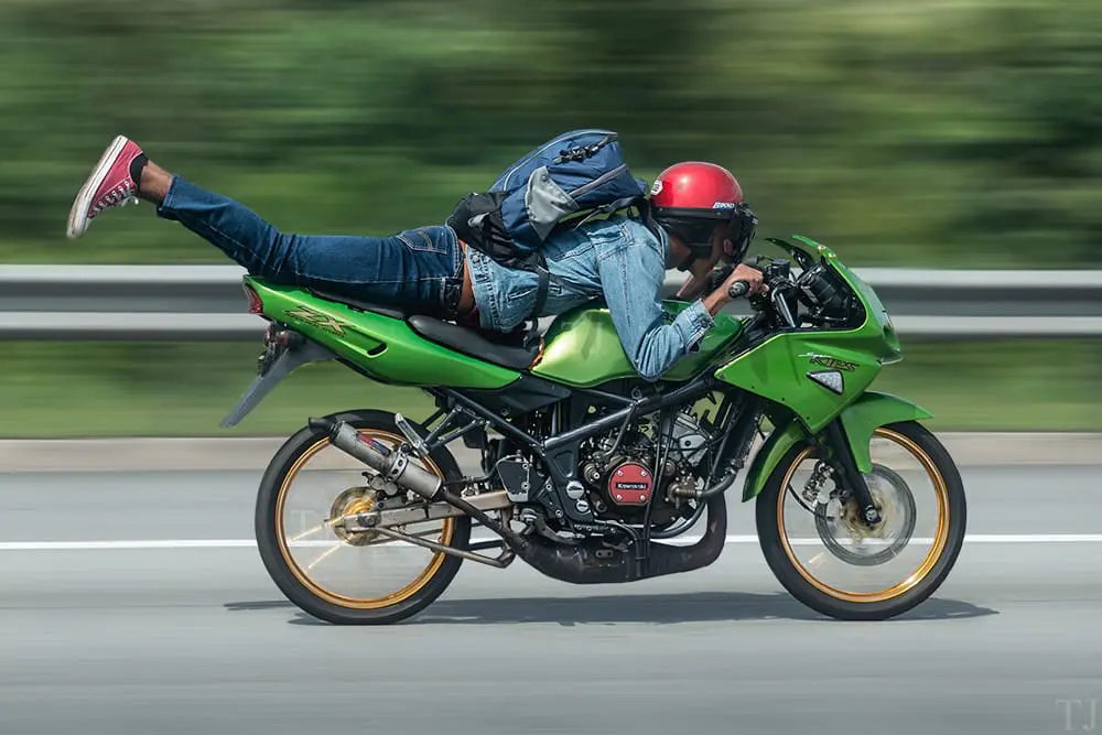 Mat rempit doing the 'Superman' stunt