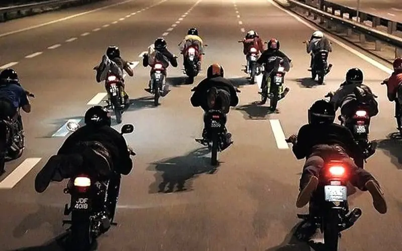 Mat rempits racing on the road