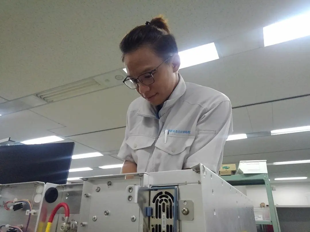 Matthew working on a device