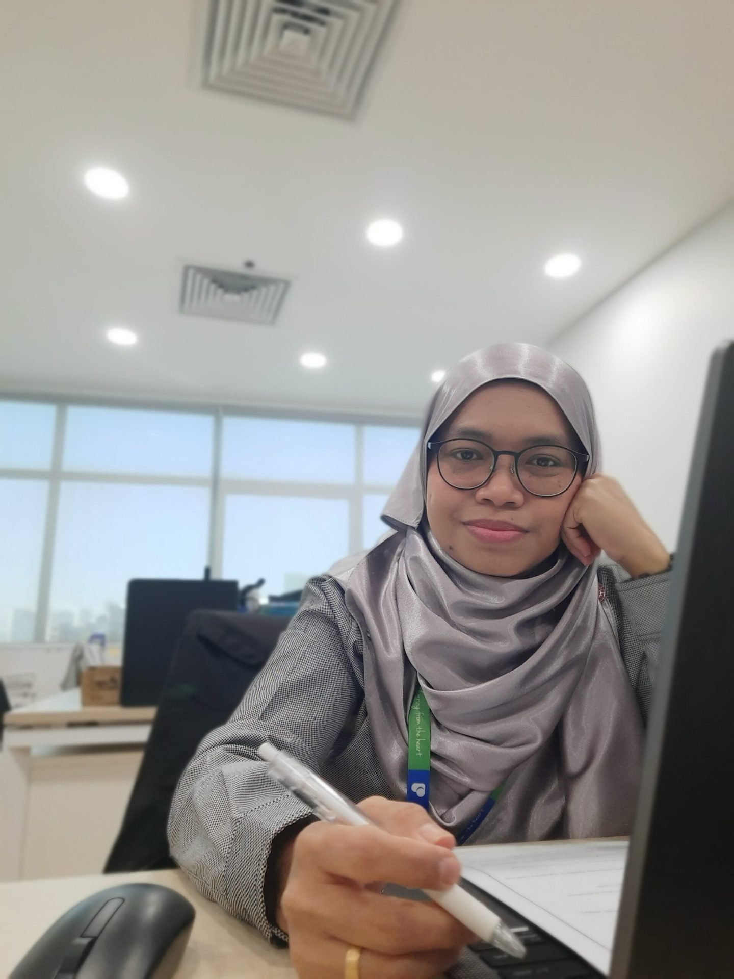 Mazwin selfie while working