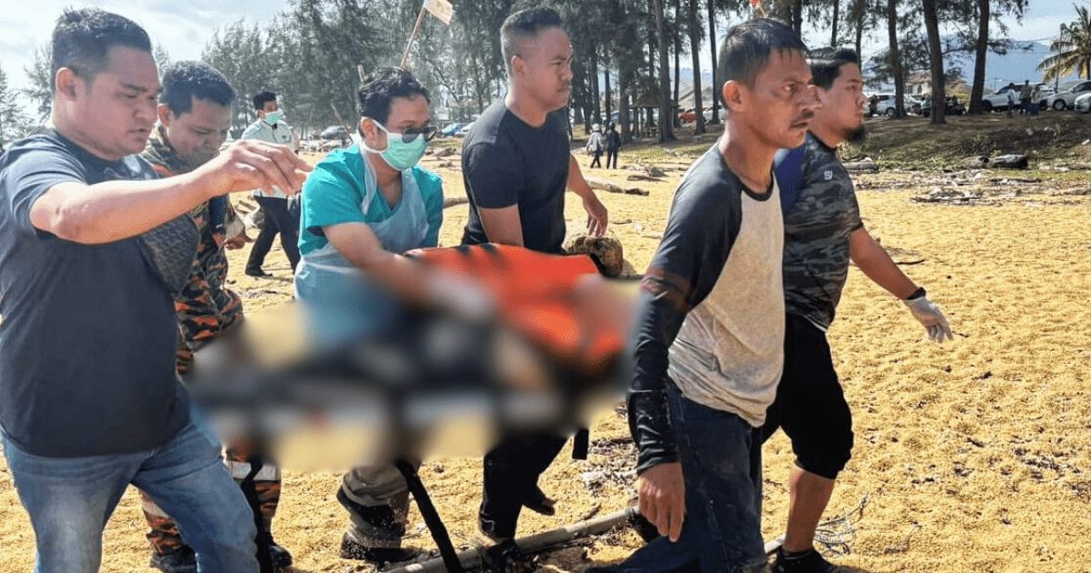 men carrying drowned woman