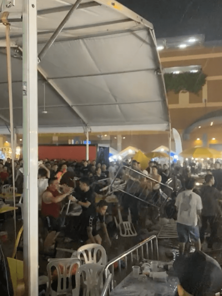 Men fighting at Songkran Festival