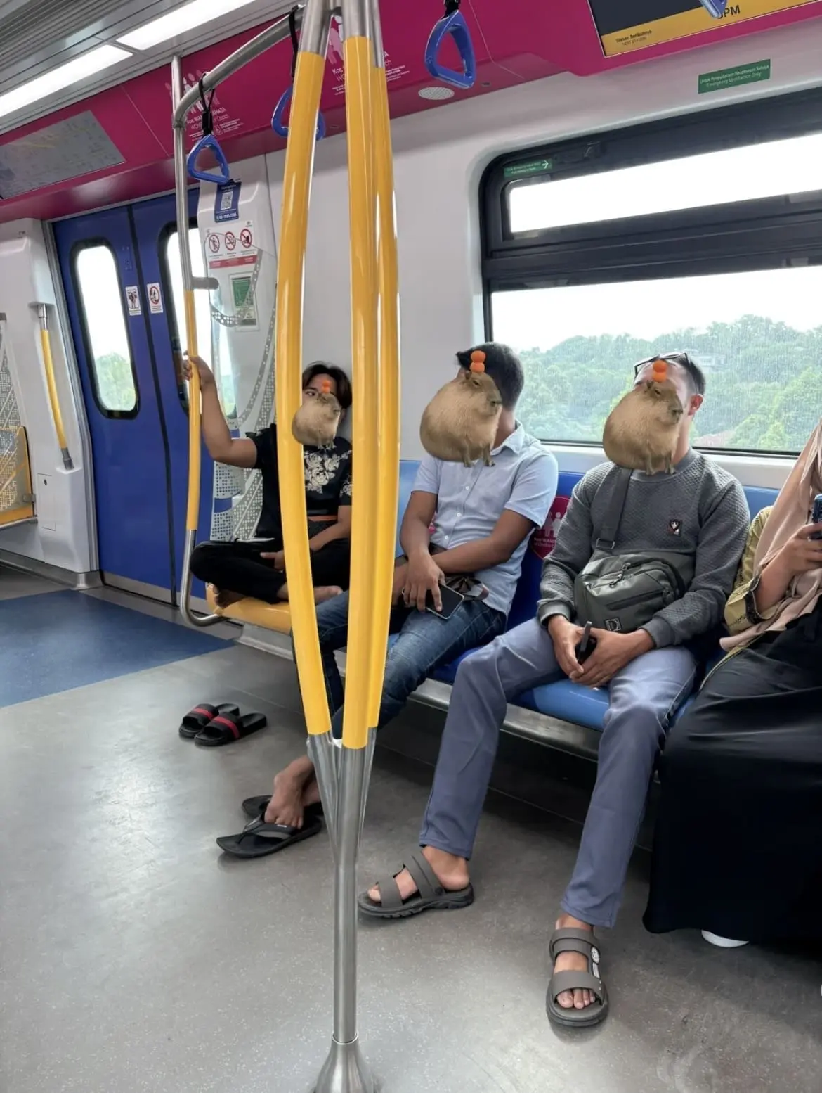 Men sit inside women's coach on Putrajaya MRT line