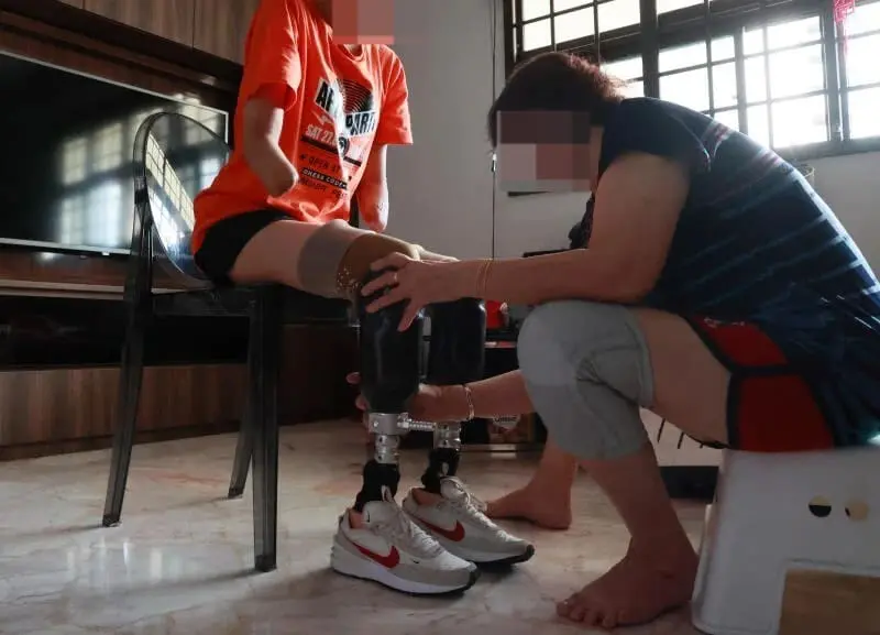 mother fixing dupe leg to her daugther